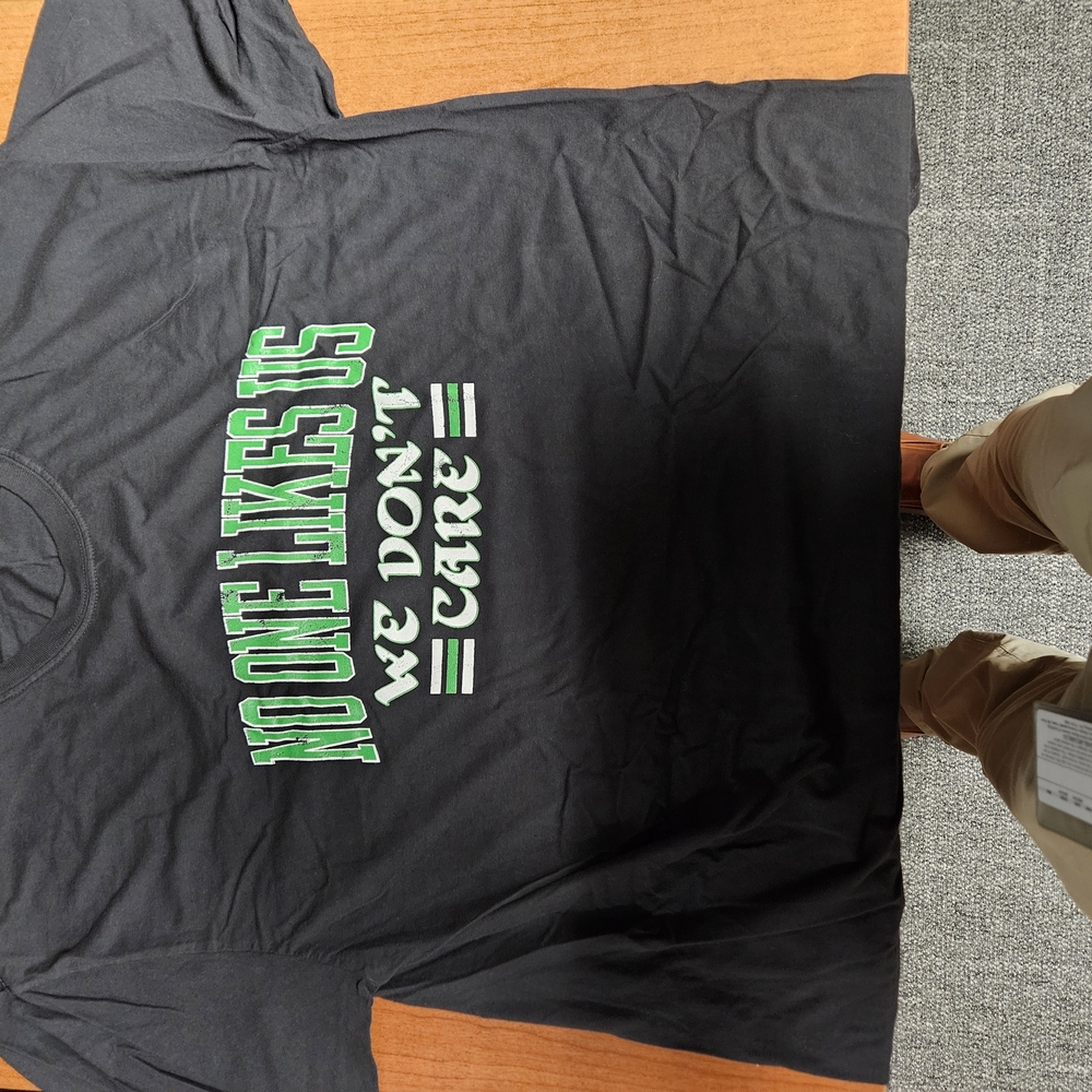 Black T-Shirt with Green Text